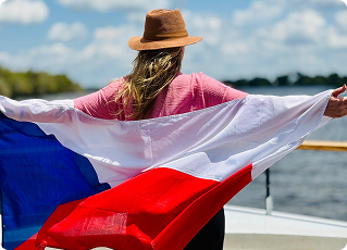 Naďa Šulcová with a Czech flag