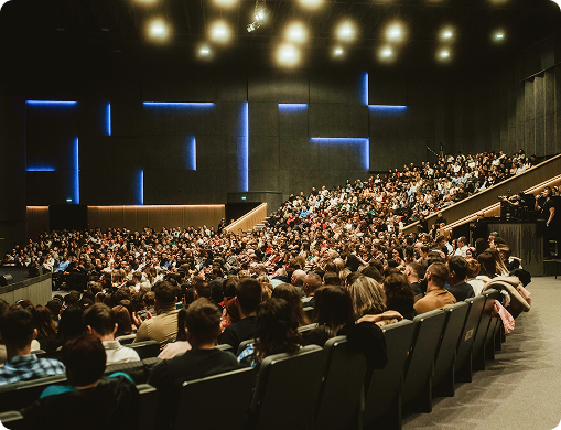 Conference audience in an auditorium